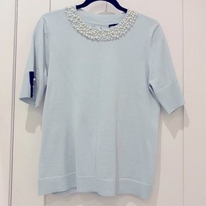 Light blue Karl Lagerfeld Paris knit top with pearl neckline